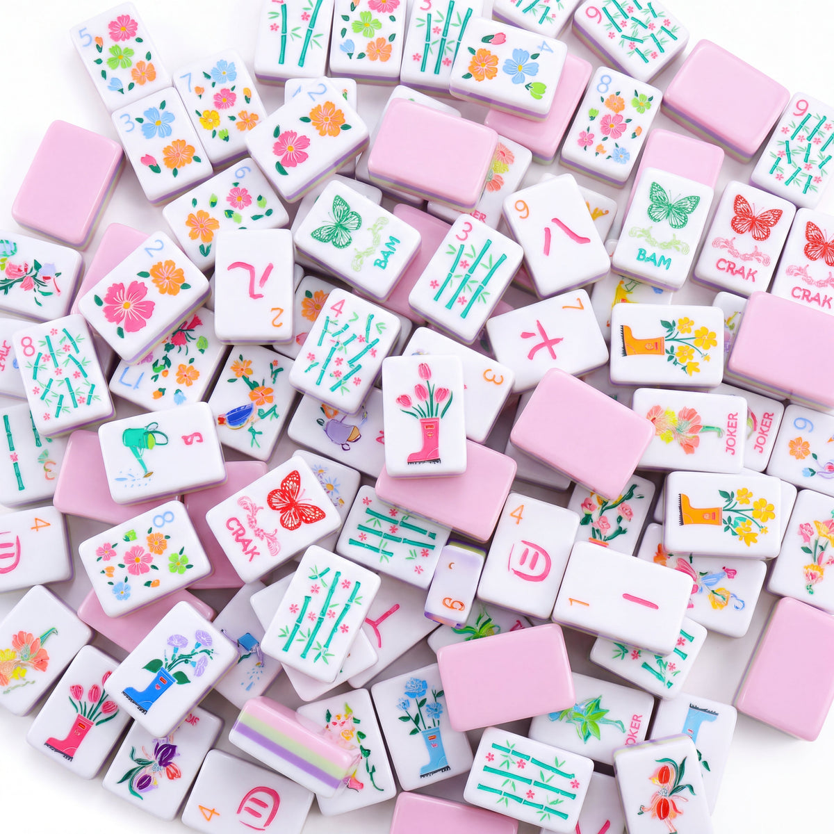Bloomsbury American mahjong tiles scattered face up and face down, showing pastel pink backs and purple and green layered edges