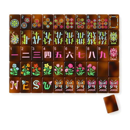 Amber American mahjong tiles, one of each tile laid out in a grid with one tile face down showing the tortoiseshell back