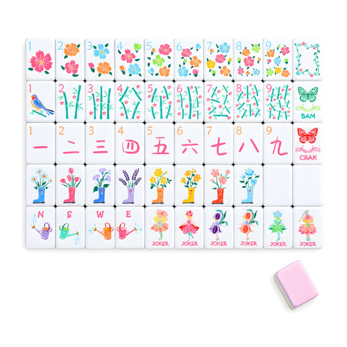 Bloomsbury American mahjong tiles, one of each tile laid out in a grid with one tile face down showing the pastel pink back