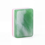 Single Empress mahjong tile from the back, showing the marbled jade green back