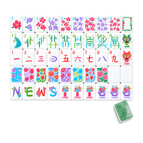 Empress American mahjong tiles, one of each tile laid out in a grid with one tile face down showing the marbled jade back