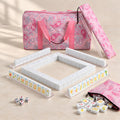 Gilded Crane American mahjong starter kit with pearly white tile walls inside four clear racks and a quilted pink paisley carrying set