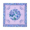 Lilac hydrangea mahjong mat with a pale orchid playing field, shown flat from above on white