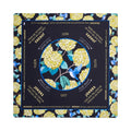 Black mahjong mat with chartreuse hydrangeas and a bluebird in the center circle, shown flat from above on white