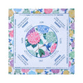 Multicolor pastel hydrangea mahjong mat on a white ground, shown flat from above on white