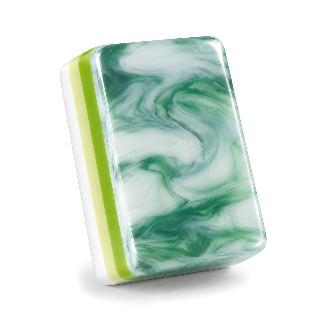 Single Jade Pavilion mahjong tile from the back, showing the green jade marble back