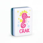 Single Key West mahjong tile showing the pink seahorse crak and the mint, teal and blue layered edge