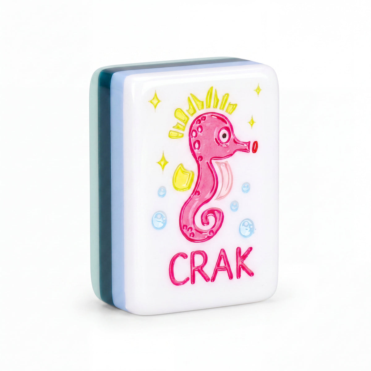 Single Key West mahjong tile showing the pink seahorse crak and the mint, teal and blue layered edge