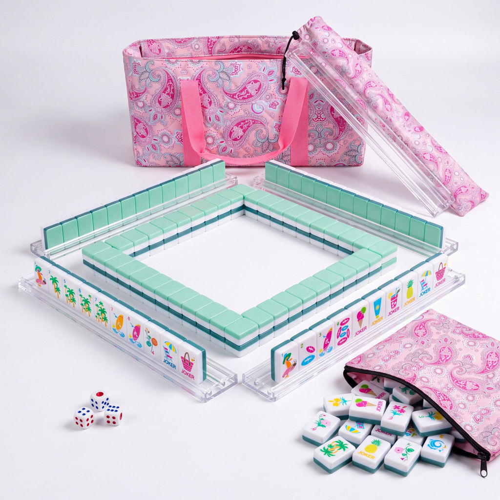 Key West American mahjong starter kit with mint green backed tiles walled inside four clear racks, a quilted pink paisley tote, drawstring rack sleeve and zippered tile pouch