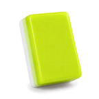 Single Limoncello mahjong tile from the back, showing the bright lime green back and layered side
