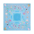 Light blue mahjong mat with cats and dogs among kennels and flowers, shown flat from above on white