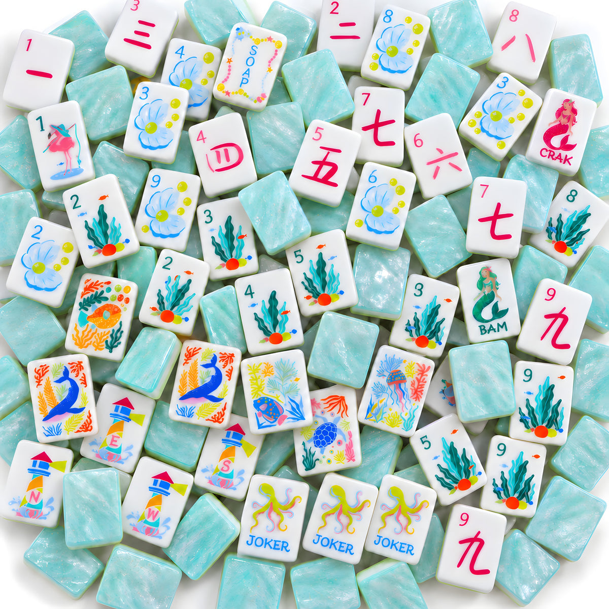 Mermaid American mahjong tiles scattered face up and face down, showing pearly aqua backs