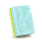 Single Mermaid mahjong tile from the back, showing the pearly aqua marbled back and layered side