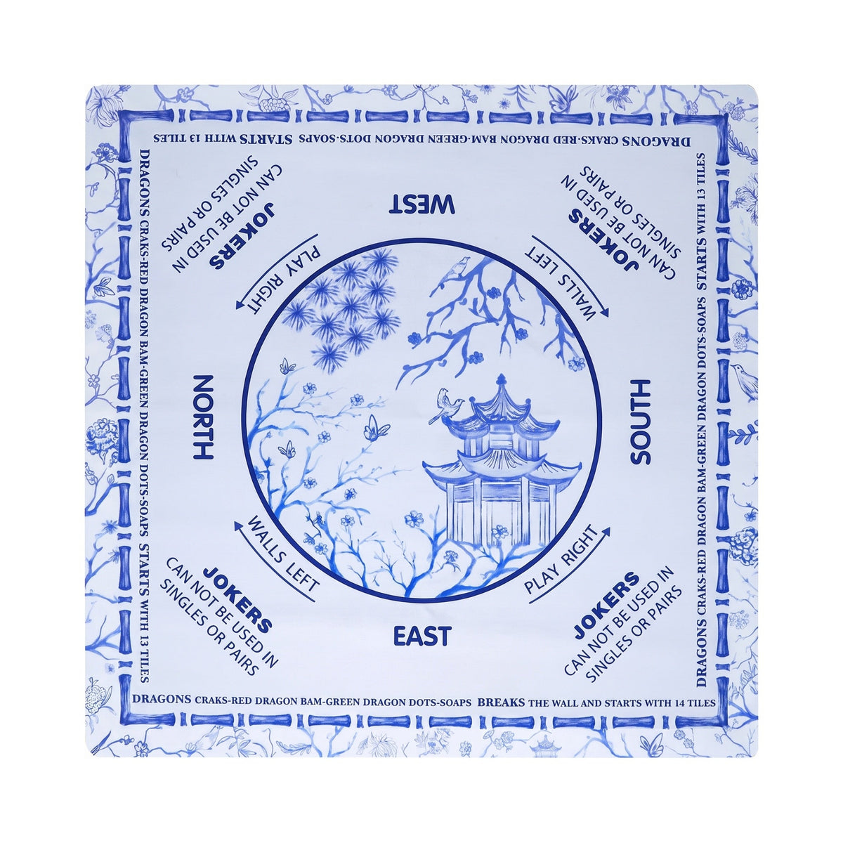 Blue and white chinoiserie mahjong mat with a tiered pagoda in the center circle, shown flat from above on white