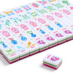 Palm Beach Pink mahjong tiles in angled rows with the koi goldfish jokers in front