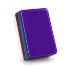 Single Plum Blossom mahjong tile from the back, showing the plum purple back and layered side