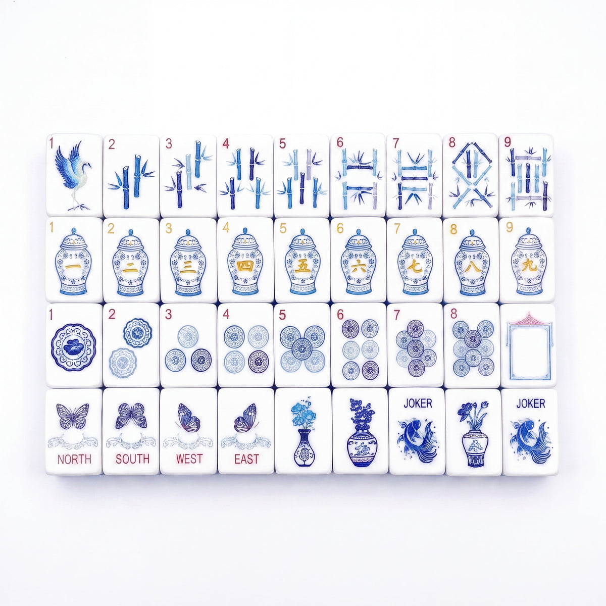 Porcelain American mahjong tiles laid out in full, with blue and white ginger jar craks, bamboo bams and porcelain medallion dots