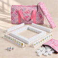 Princess Pearl American mahjong starter kit with pearly white tile walls inside four clear racks, a quilted pink paisley tote, drawstring rack sleeve and zippered tile pouch