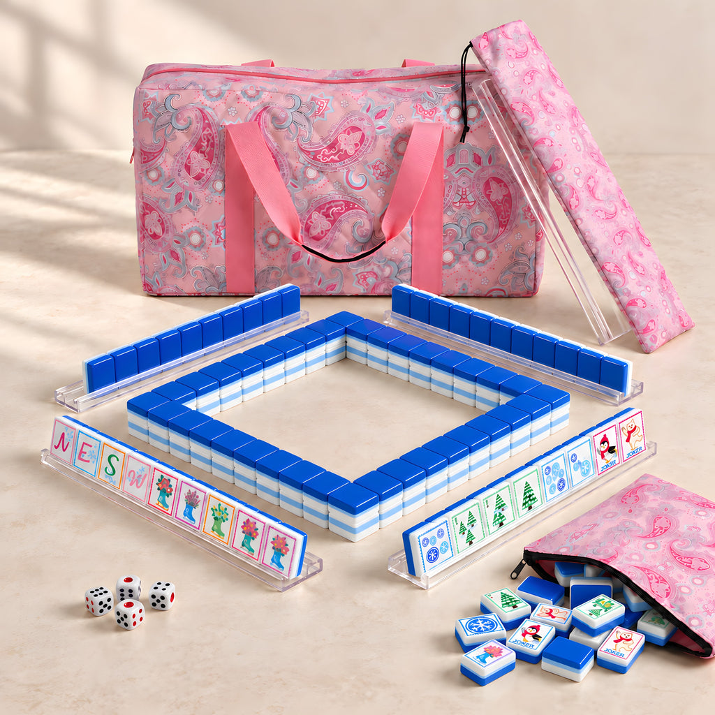 Snow Day American mahjong starter kit with cobalt blue tile walls inside four clear racks and a quilted pink paisley carrying set