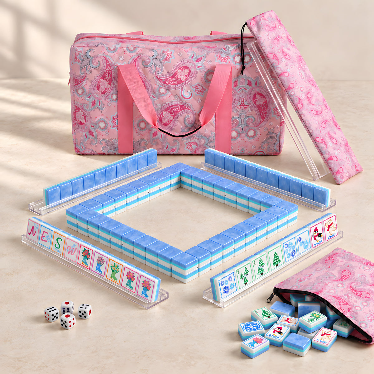 Snowfall American mahjong starter kit with periwinkle tile walls inside four clear racks and a quilted pink paisley carrying set