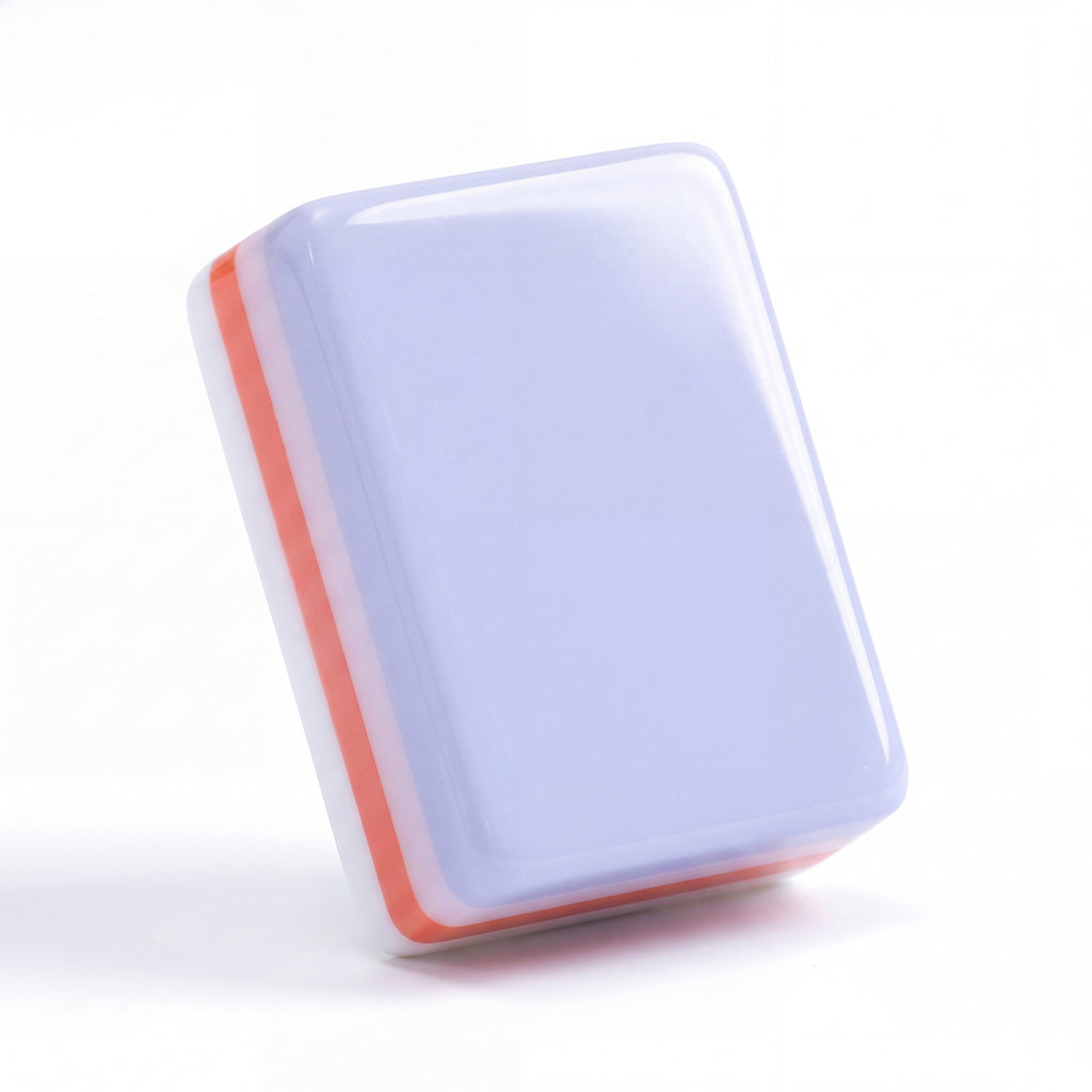 Single Violette mahjong tile from the back, showing the pale lavender back
