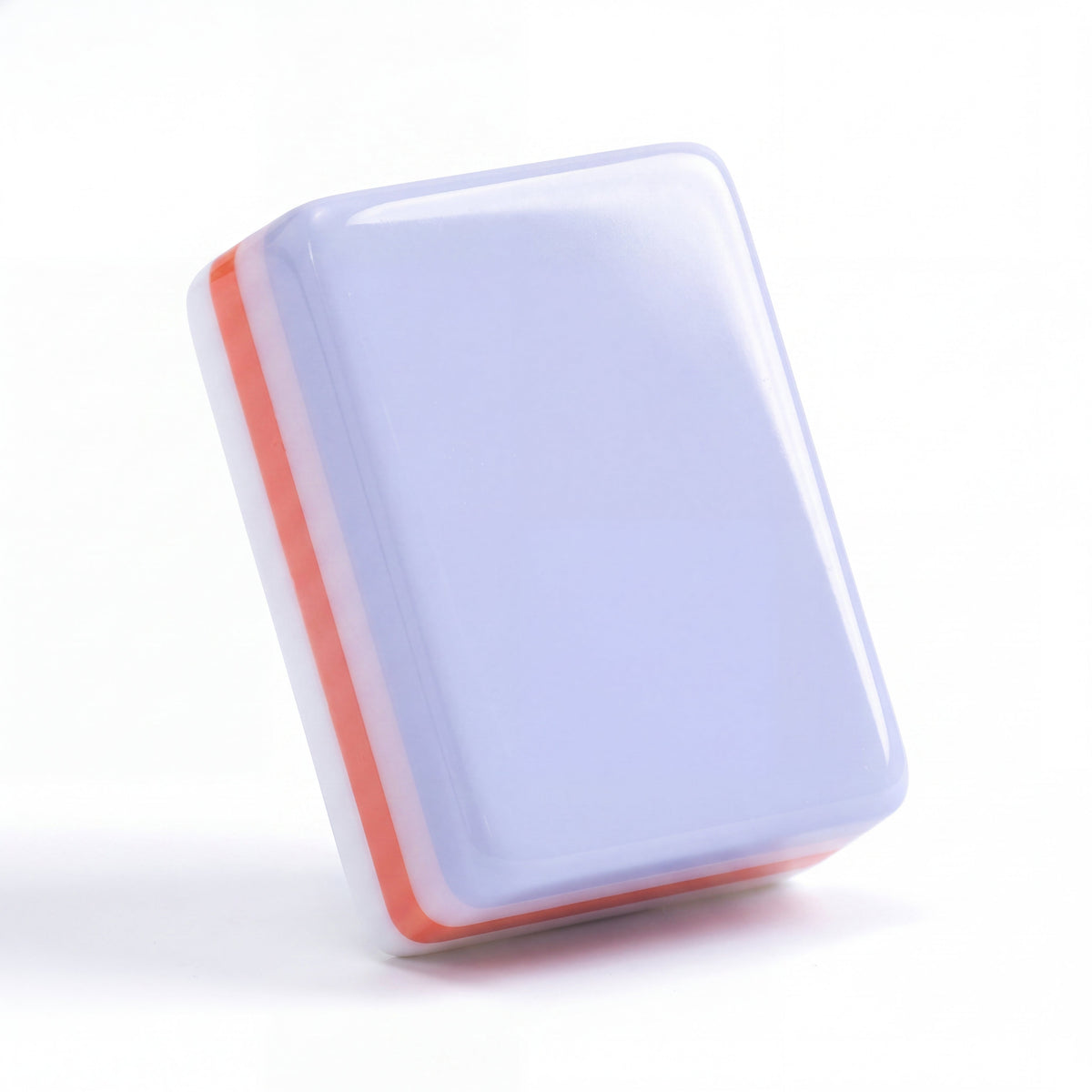 Single Violette mahjong tile from the back, showing the pale lavender back